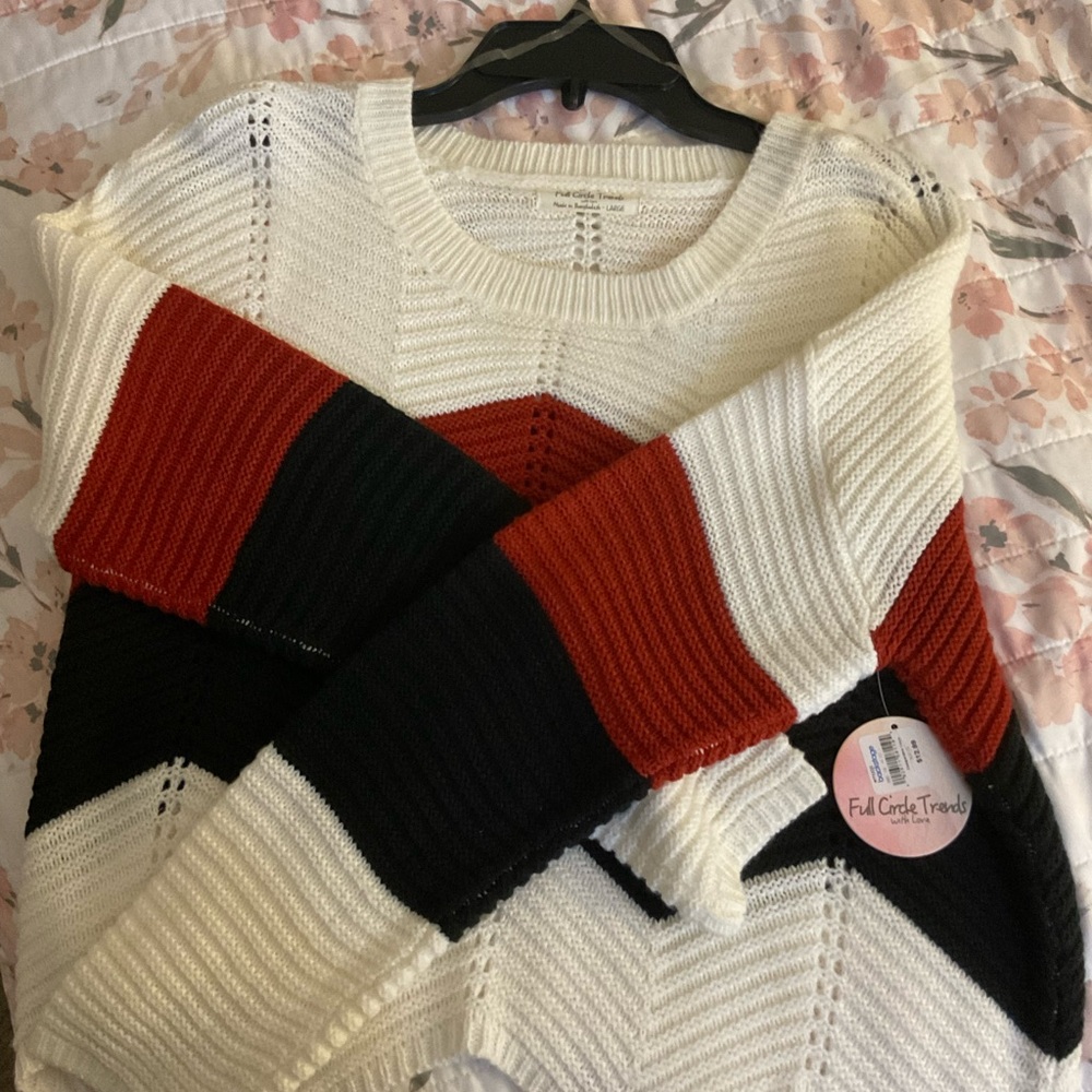 It’s teen/young adult sweater size L. It has never been worn and w/ tag